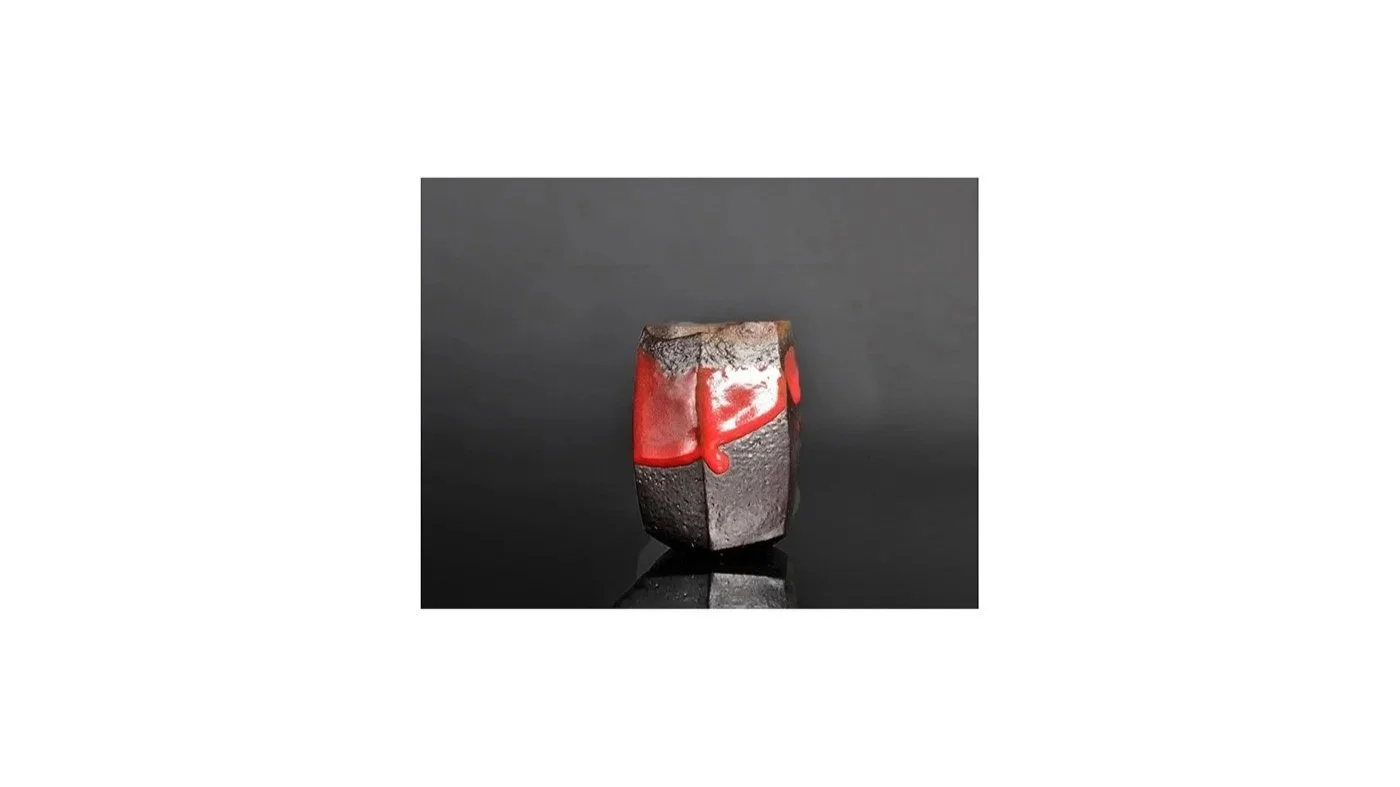 TAKENAKA Kenji (b. 1957), black Bizen sake cup with red glaze, H 10 cm x W 7 cm. 
