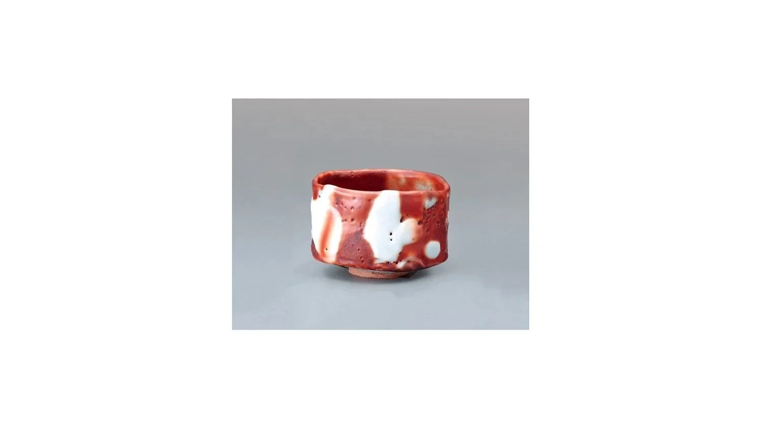 SUZUKI Osamu (b. 1934), Red Shino tea bowl, H 9 cm x W 13.3 cm. Private collection.
