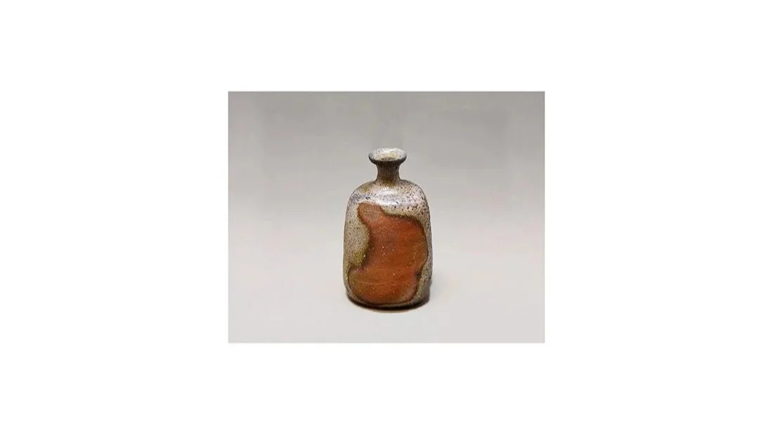 WAKIMOTO Hiroyuki (b. 1952), sake flask (tokkuri) with abstract flame marks (hiro), natural ash glaze, H 13.2 cm x W 8 cm. 