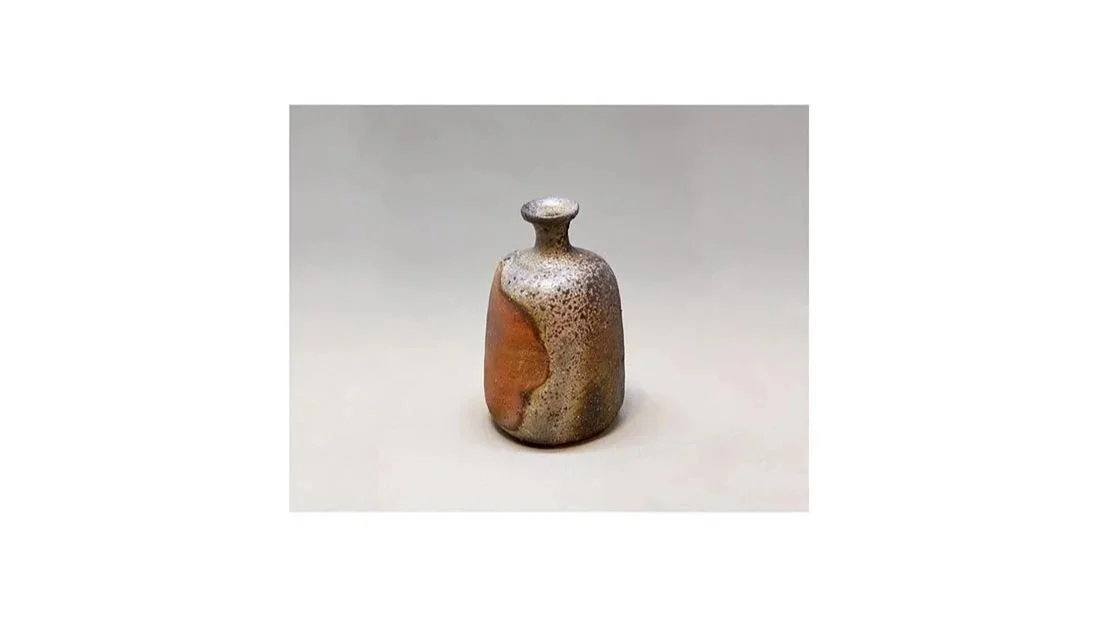 WAKIMOTO Hiroyuki (b. 1952), sake flask (tokkuri) with abstract flame marks (hiro), natural ash glaze, H 13.2 cm x W 8 cm. 
