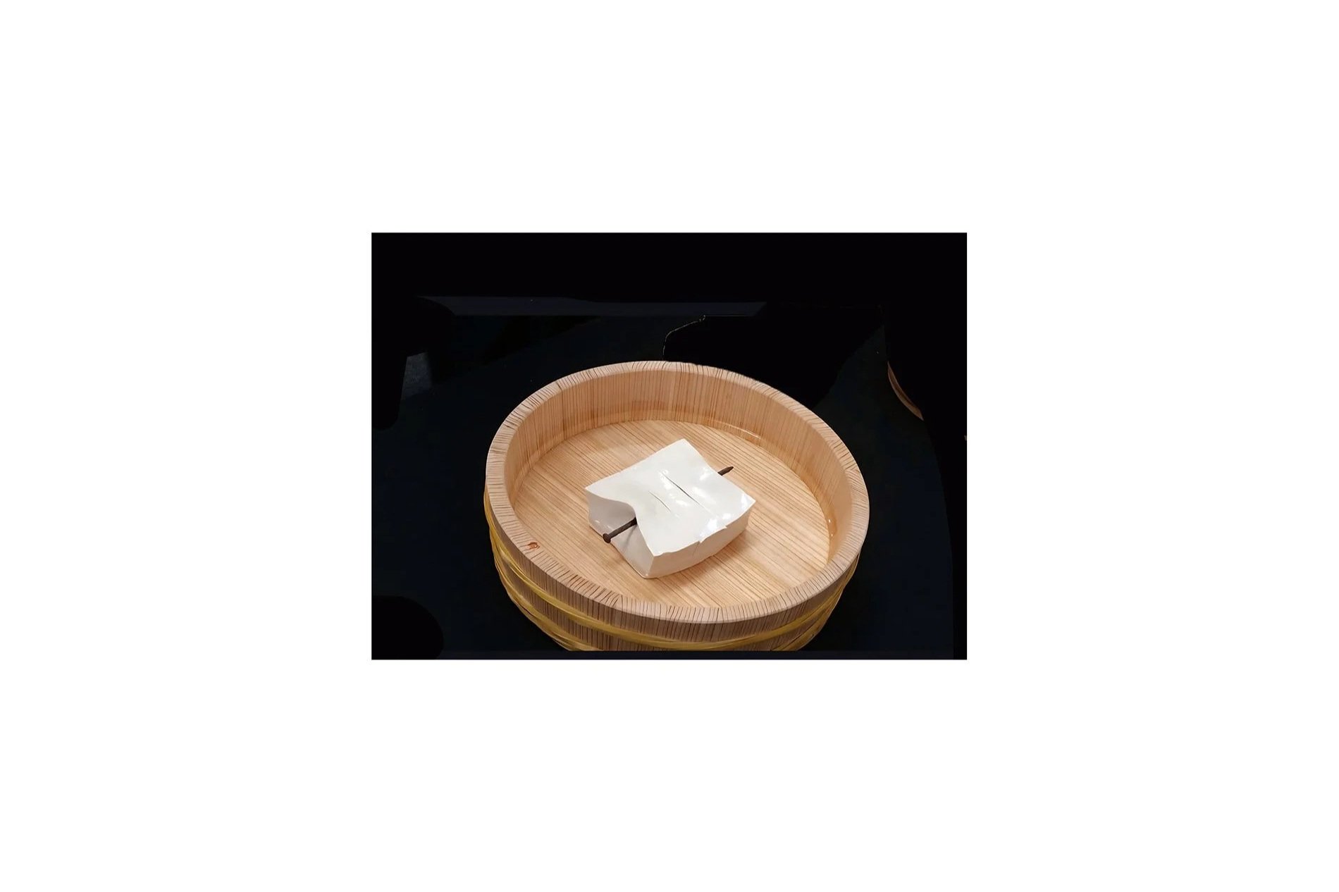 Takaki Kenta (b. 1986), Porcelain tofu with nail, L 13 cm x W 10 cm x D 5 cm. Exhibited by Japan Foundation, Los Angeles in August 2026. 