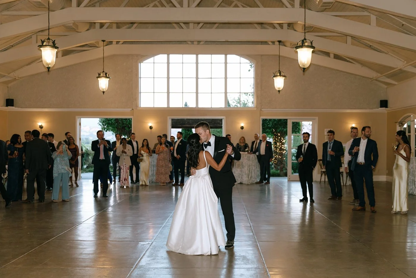 Bride and groom dancing in the Sala de Leon Pavilion at Trentadue Winery