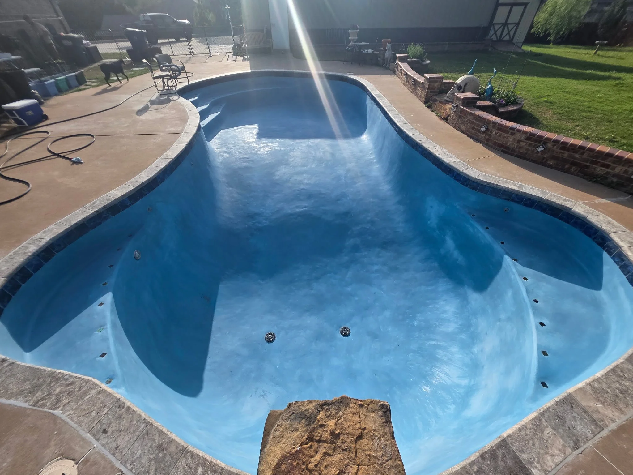 Pool Remodel with new coping, taho blue quartz plaster, 6x6 tile, and grey mastics in Guthrie OK.