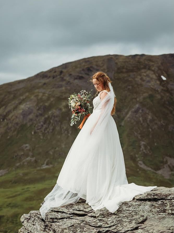 Some gowns are made for more than one moment, this was one of them. 🤍

@erwittenberg didn&rsquo;t just walk down the aisle, she gave a beautiful gown a continued love story! 

📷: @caparks14 

#alaskabride #alaskawedding #sustainablebridal