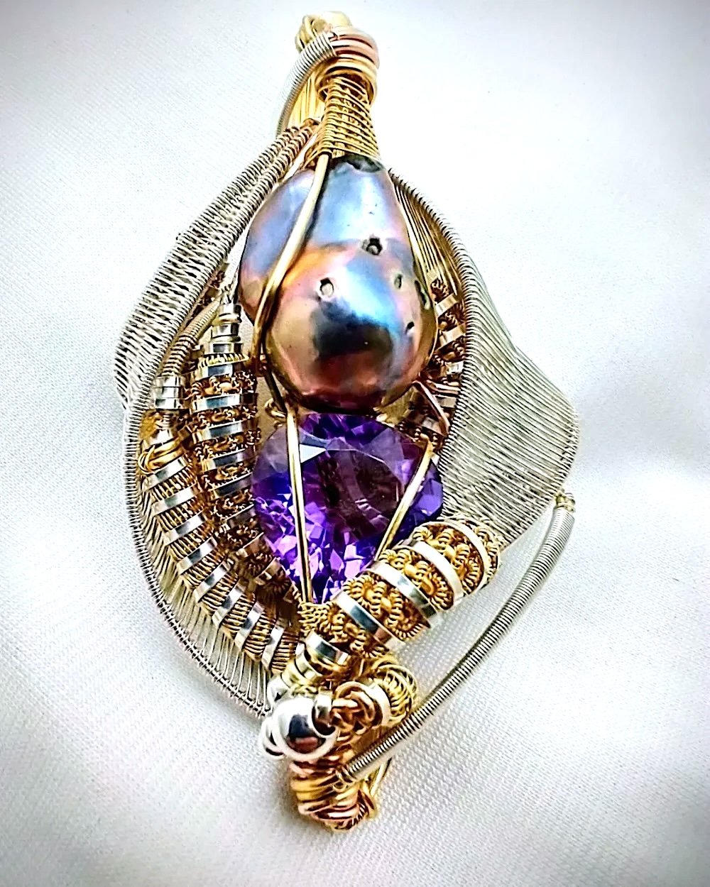 tahitian_pearl_and_amethyst_Amulet.jpeg