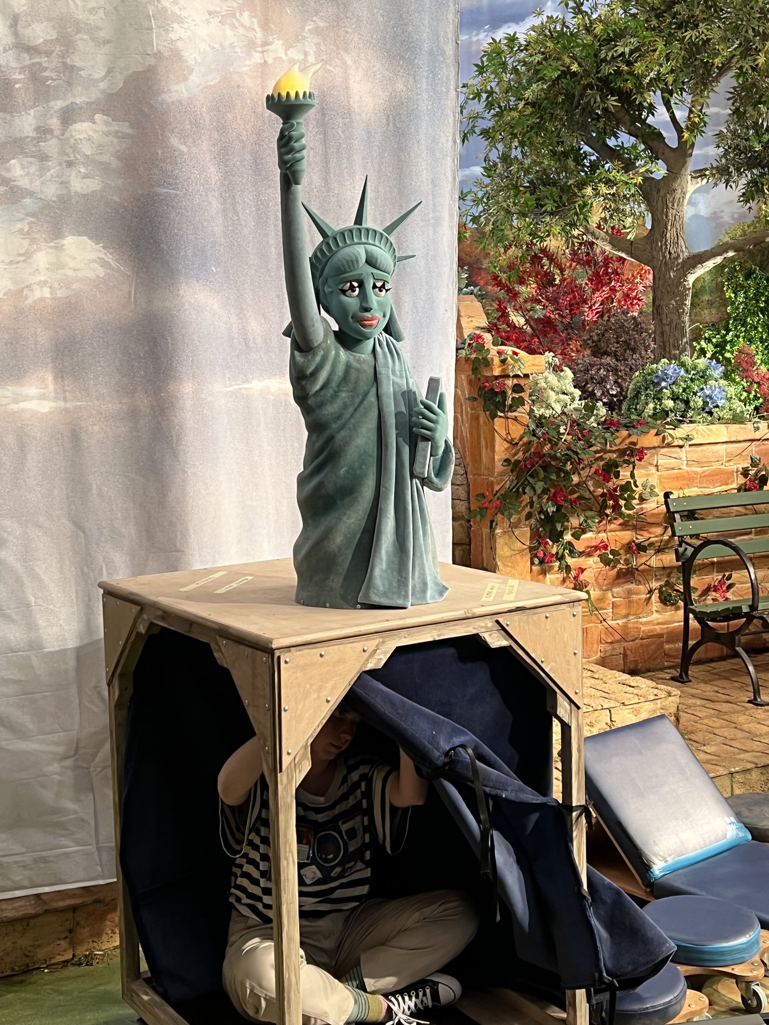 Lady Liberty on the Budapest set dressed as the fictional Good Day Sunshine puppet studio.