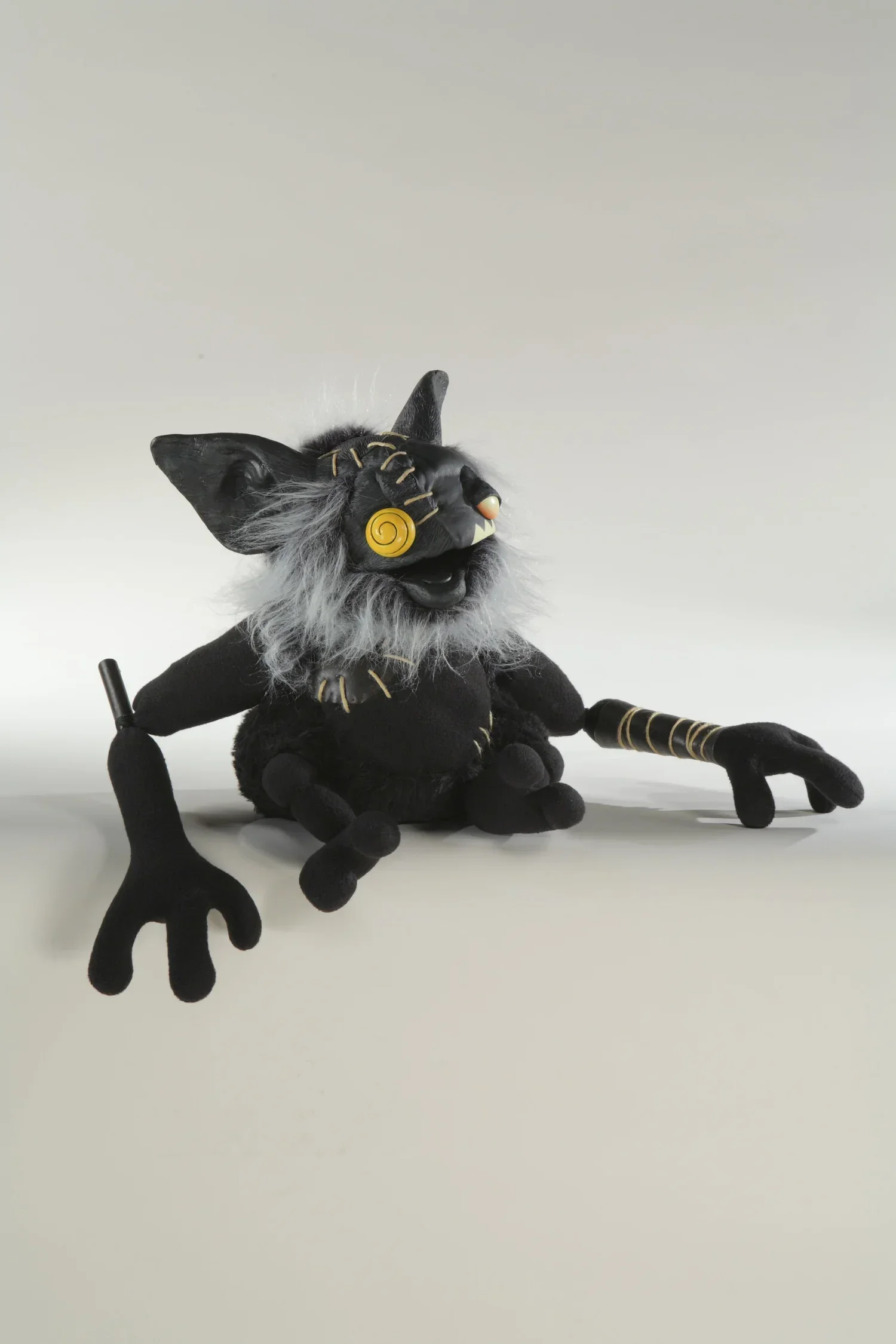 A demon puppet bat creature designed by puppet designers Stitches and Glue