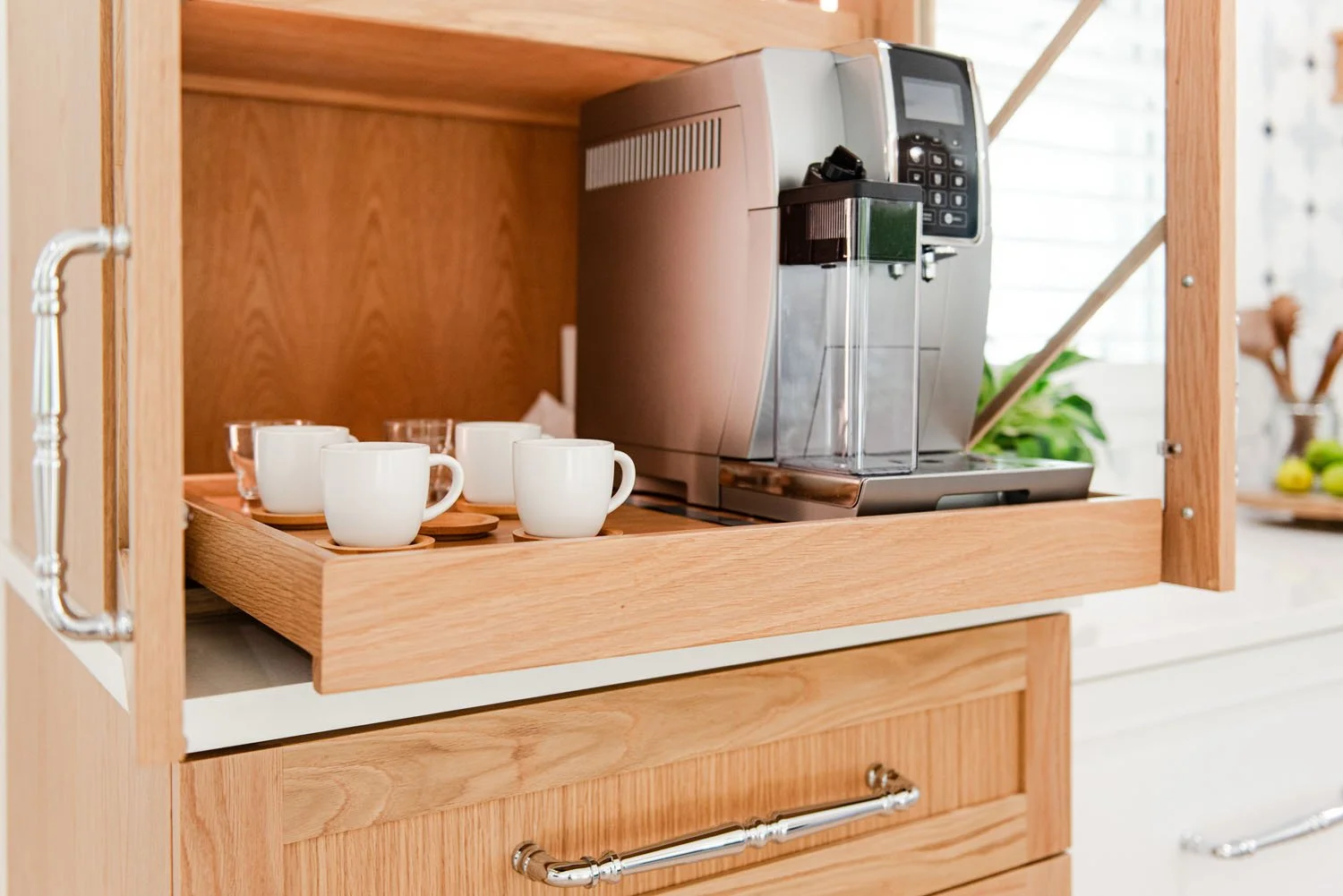 Pull-out coffee station with espresso machine and white mugs