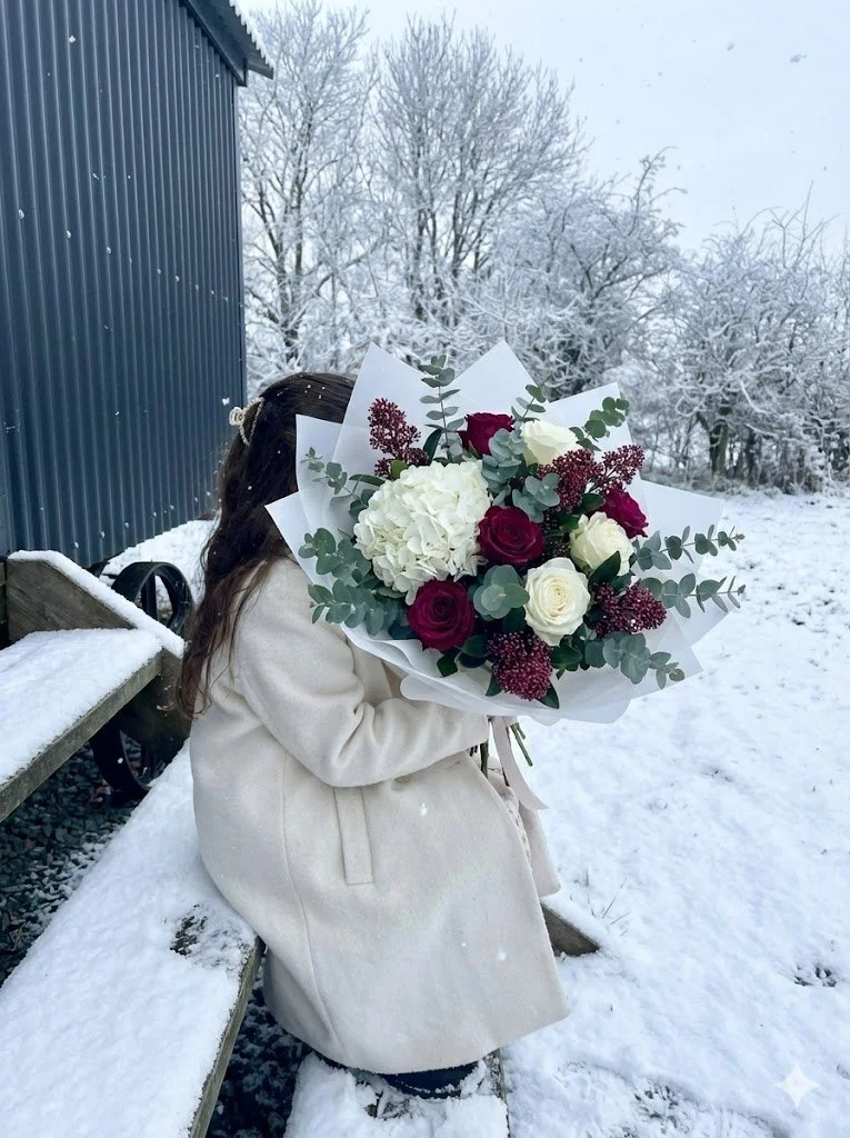 Beautiful Winter Flower Arrangements by Blossoms House of Flowers