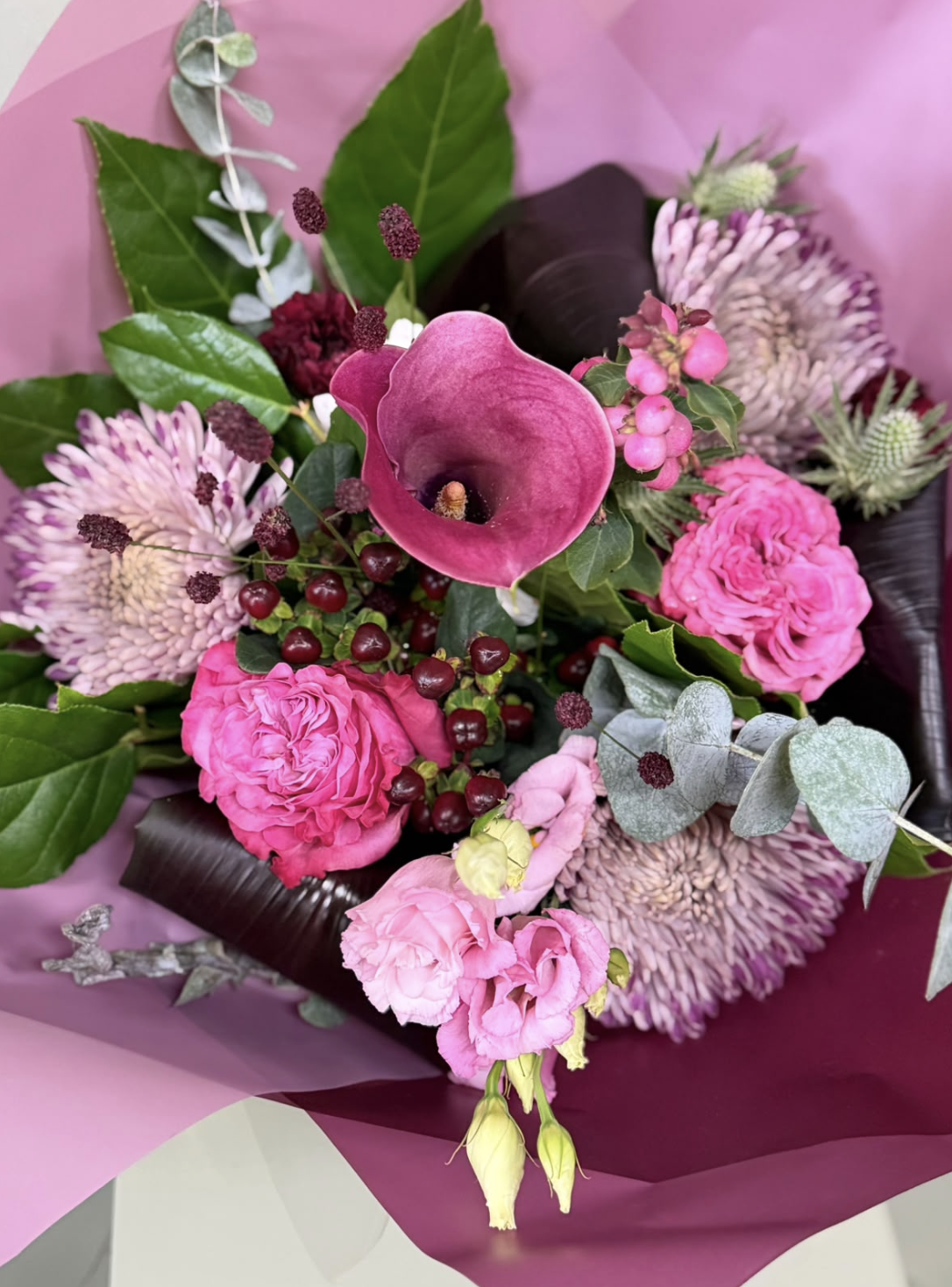 Fig & Berries pink bouquet with calla lily, roses and berries by Blossom's House of Flowers