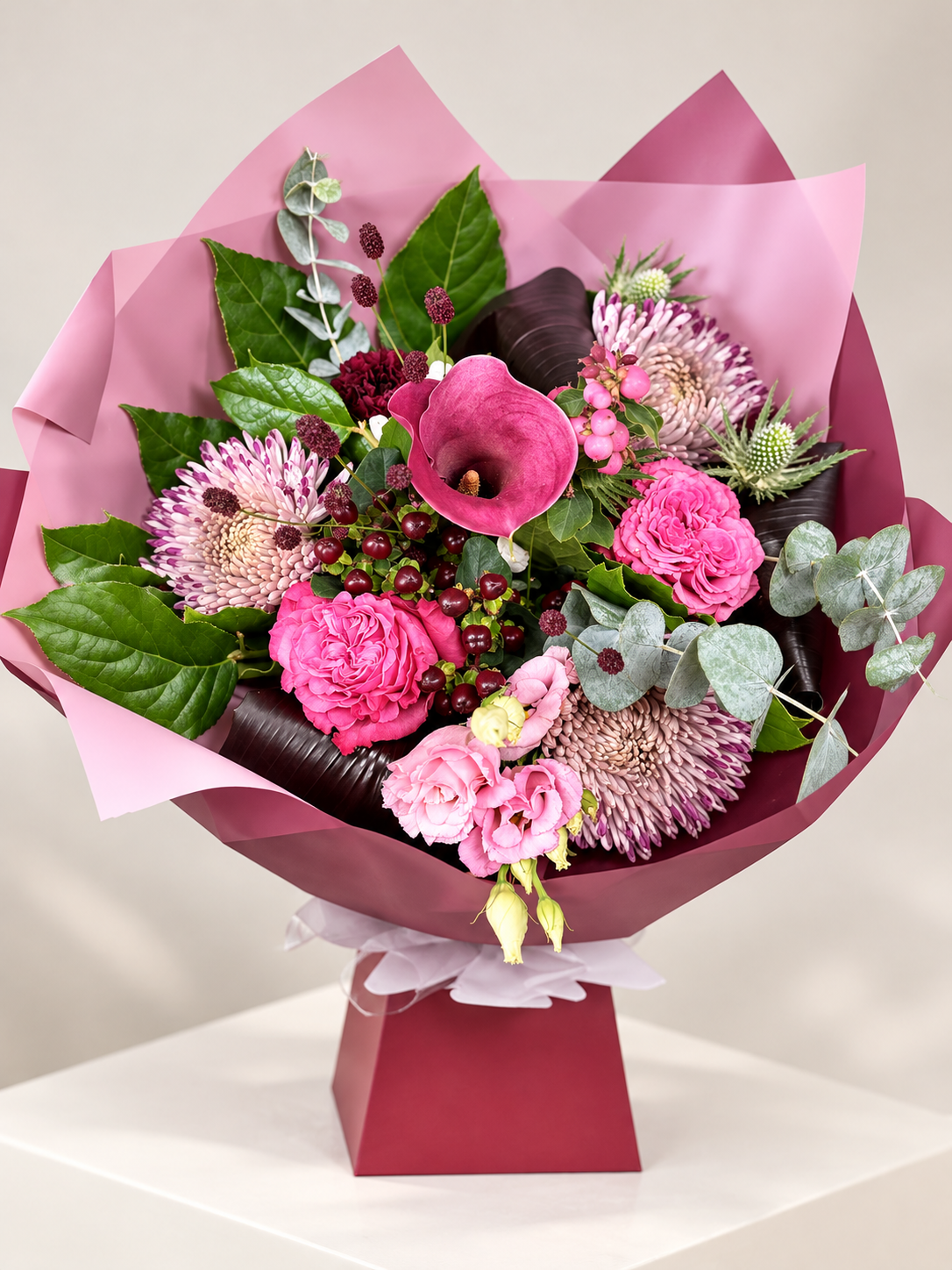 Fig & Berries pink bouquet with calla lily, roses and berries by Blossom's House of Flowers