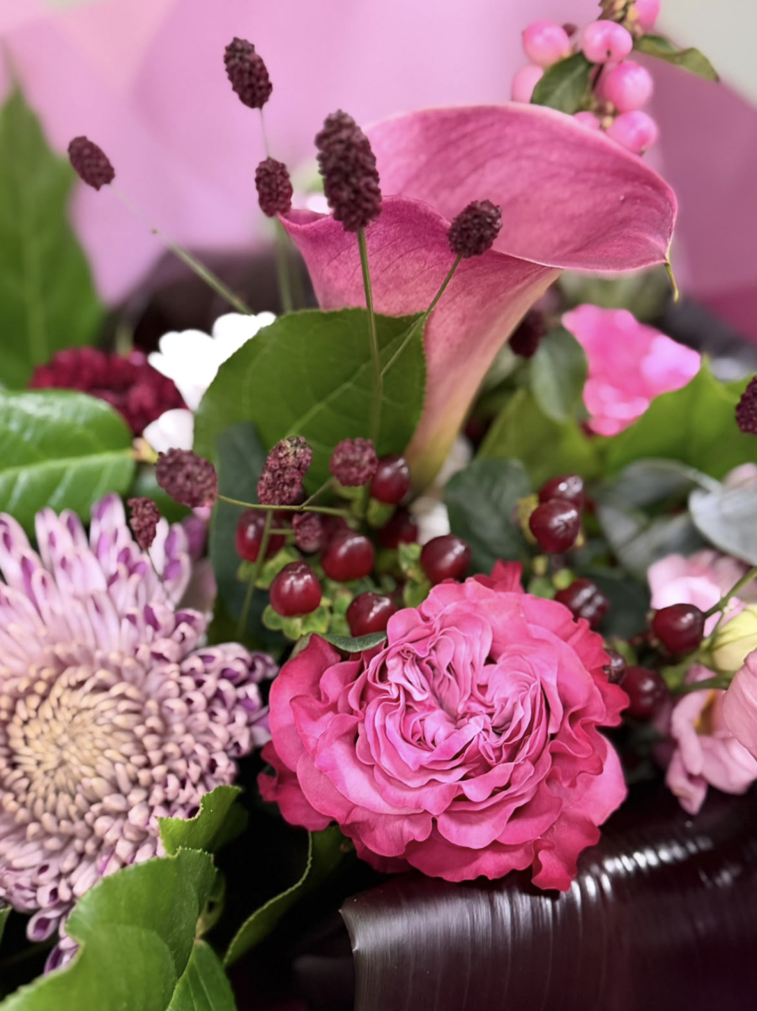 Fig & Berries pink bouquet with calla lily, roses and berries by Blossom's House of Flowers