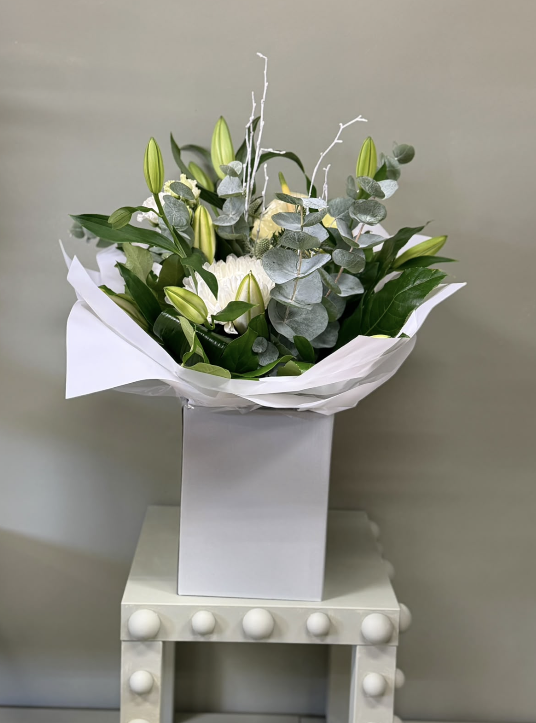 Alabaster white bouquet with lilies, chrysanthemum and eucalyptus by Blossom's House of Flowers