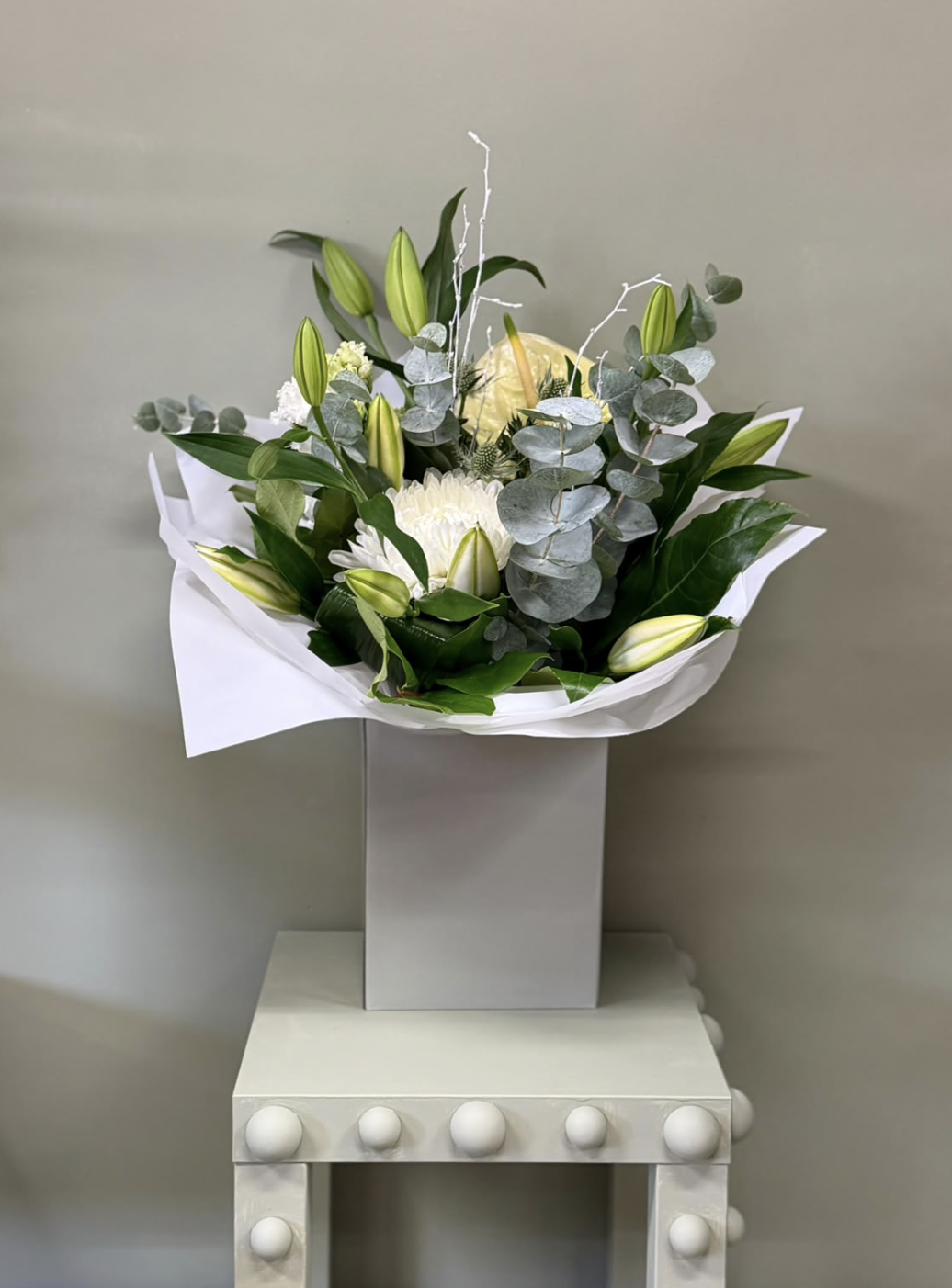 Alabaster white bouquet with lilies, chrysanthemum and eucalyptus by Blossom's House of Flowers