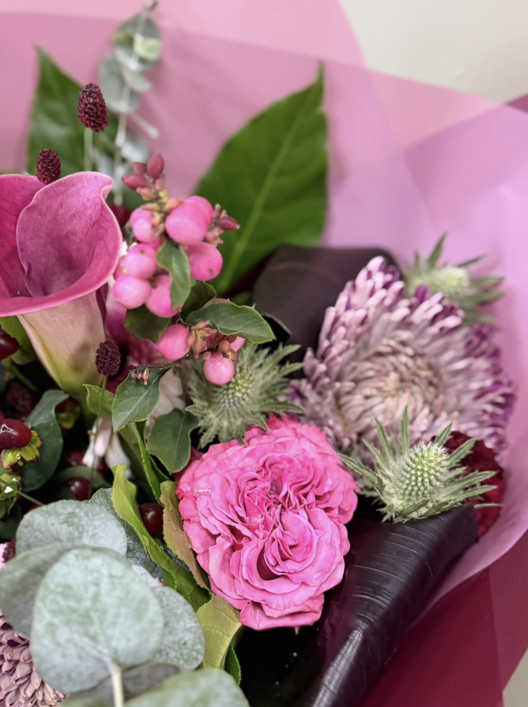 Fig & Berries pink bouquet with calla lily, roses and berries by Blossom's House of Flowers