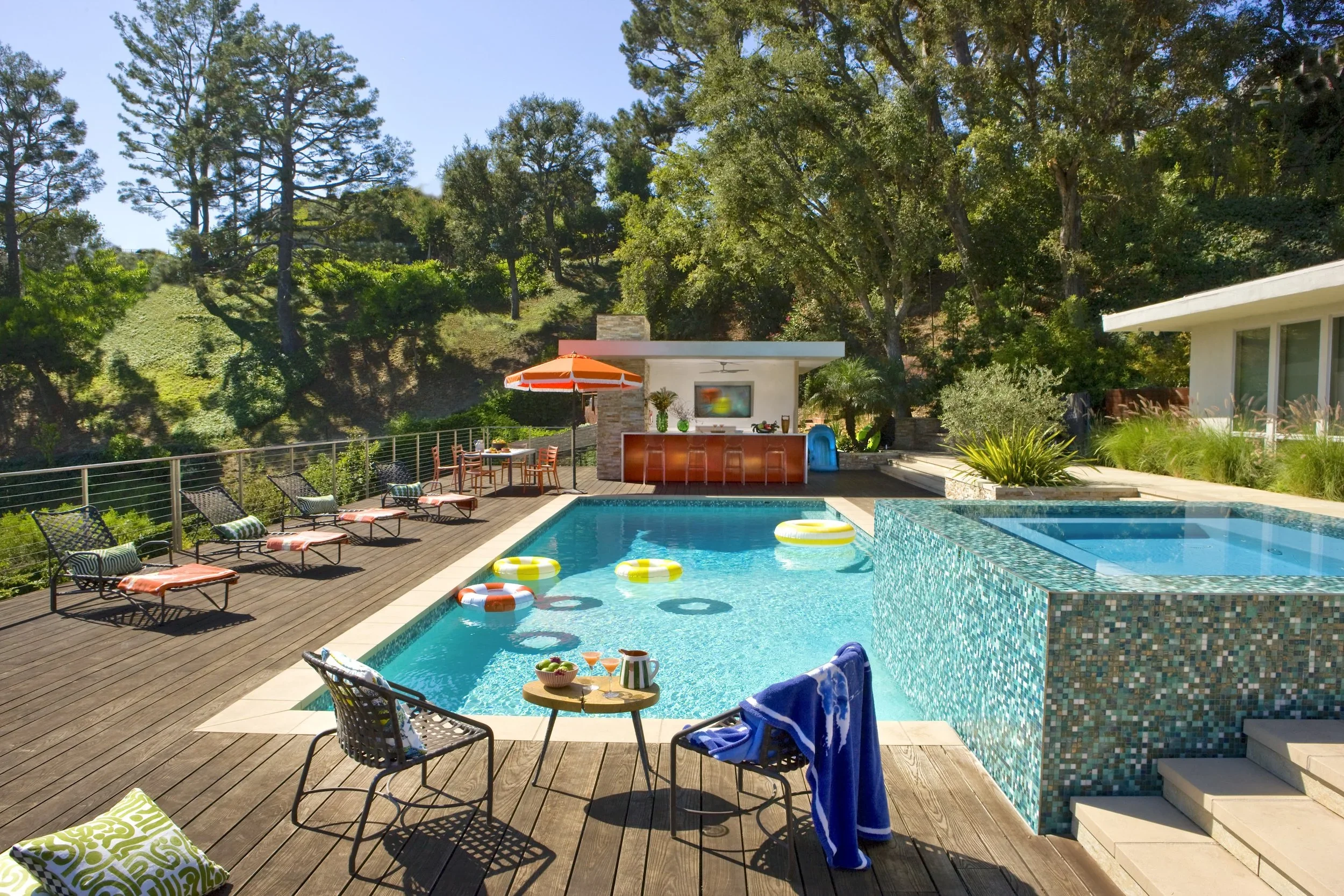 Contemporary Outdoor Kitchen Or Bar Integrated Into A Pool Terrace Outdoor Kitchen Remodel by Houck Construction Inc. project photo