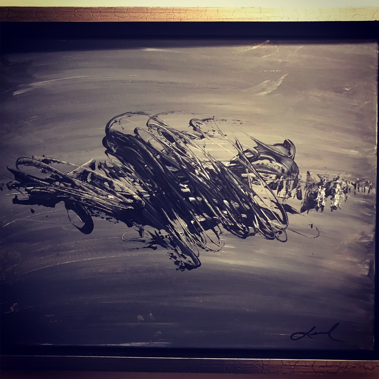 Abstract black and white painting with swirling lines and shapes, featuring a small group of figures or animals in the background.