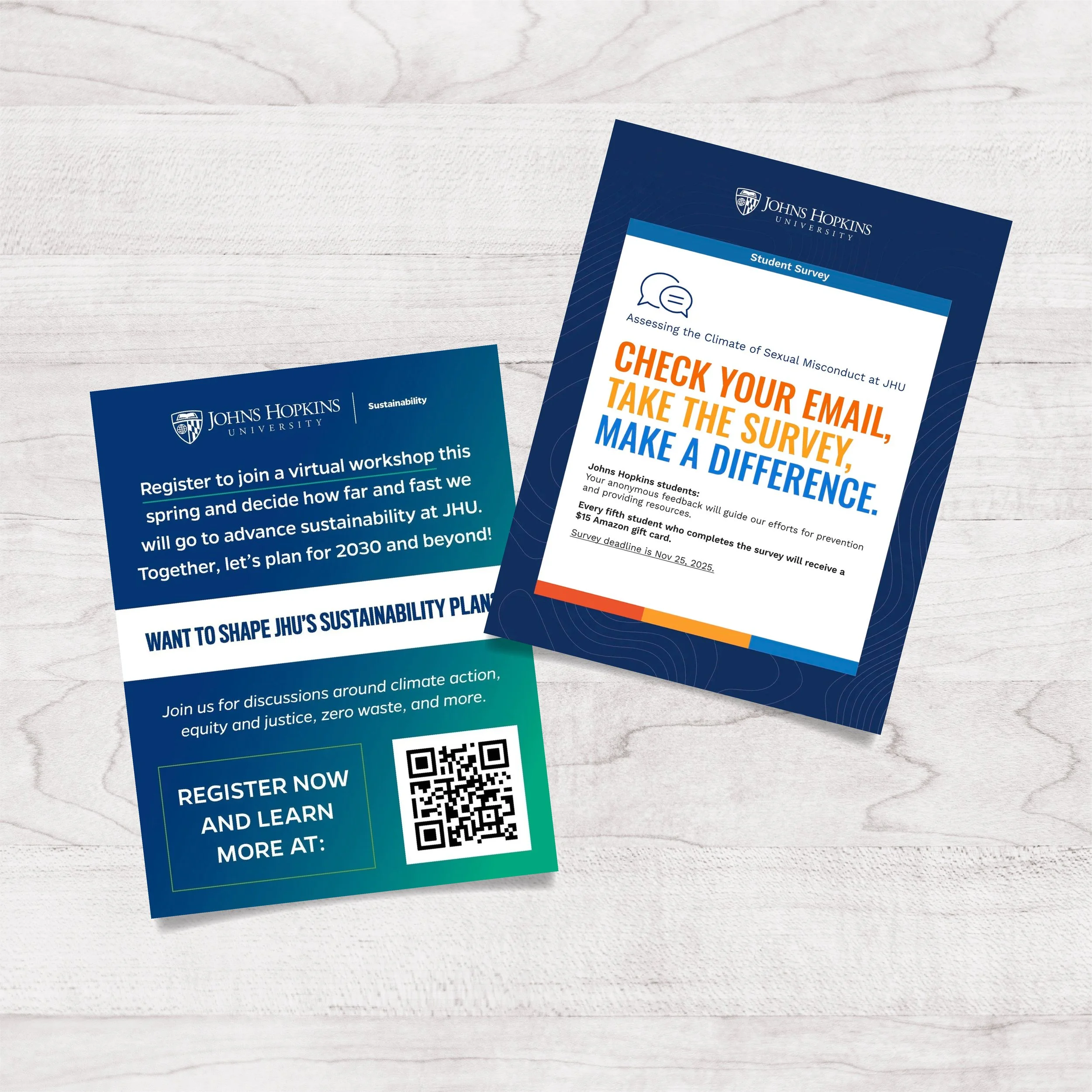 Two flyers from Johns Hopkins University on a light wooden surface. The flyer on the left promotes a virtual workshop on sustainability, with a QR code for more information. The flyer on the right is about a student survey, encouraging students to ch