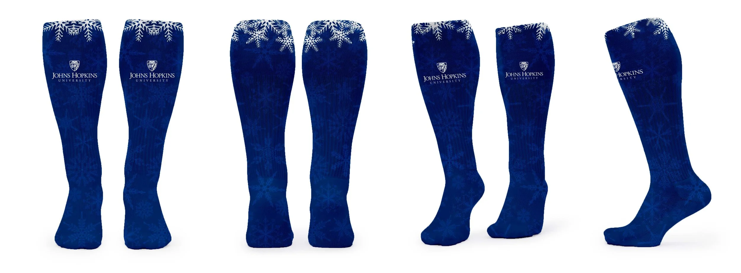 Row of six blue knee-high socks with white snowflakes and the Johns Hopkins University logo, arranged from front to back.