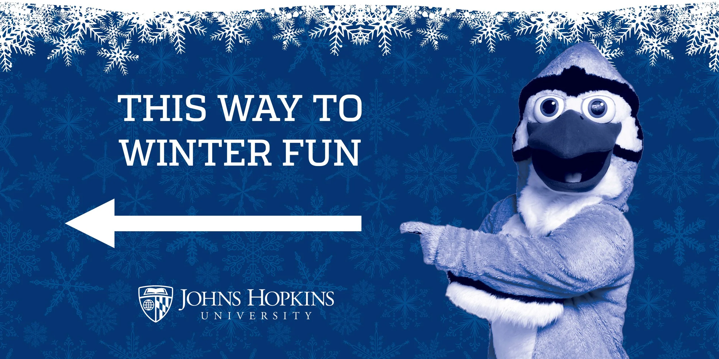 A blue promotional graphic with snowflake patterns, featuring a mascot in a bird costume pointing to the left, and the text 'This way to winter fun' alongside the Johns Hopkins University logo.