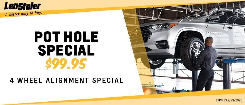 Advertisement for Lenstoler featuring a car lifted on a service lift, a mechanic inspecting the wheel, and text promoting a special offer on wheel alignment for $99.95, valid until February 29, 2020.