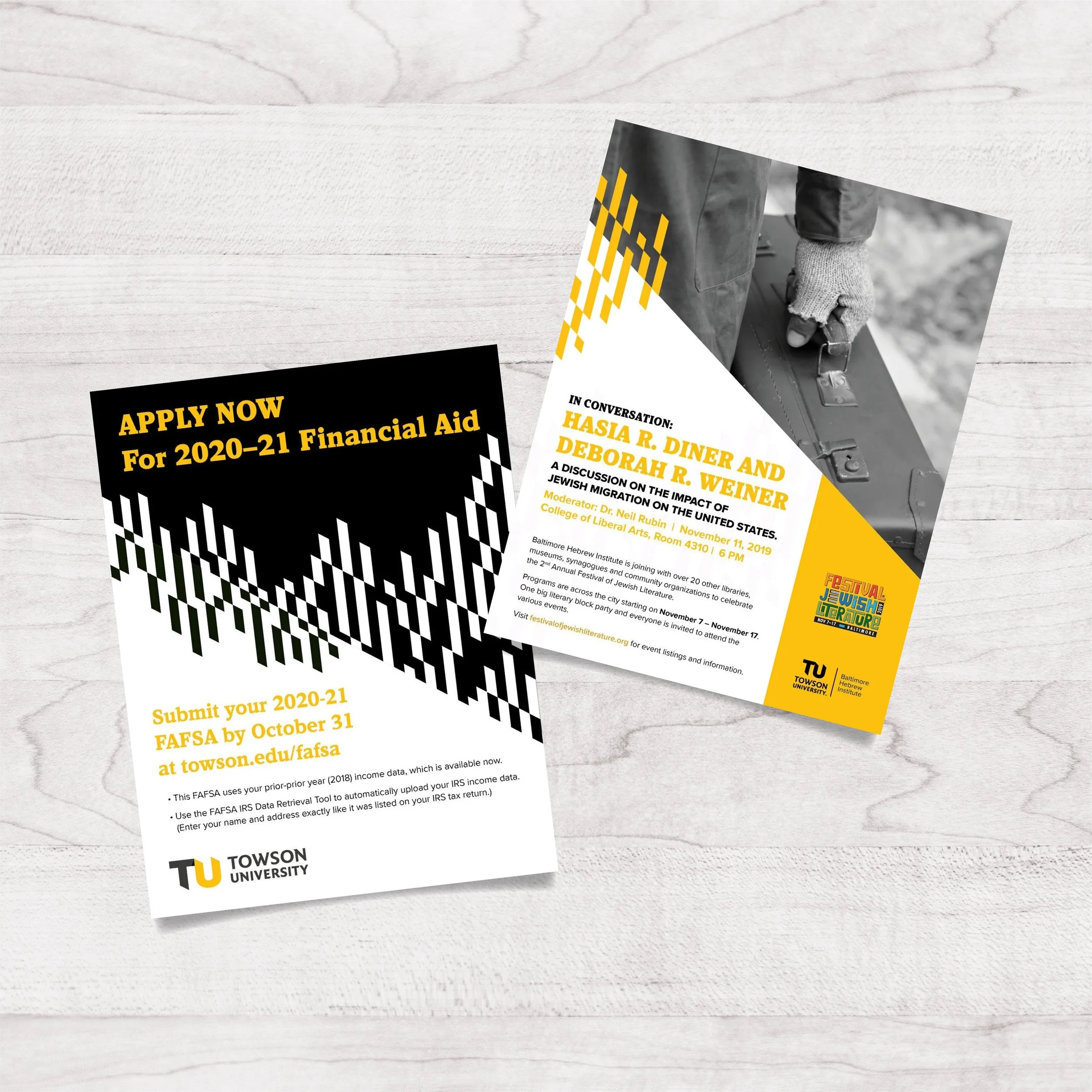 Flyers on a white wooden surface, one promoting financial aid application for Towson University and the other advertising a lecture by Hasia R. Diner and Deborah R. Weiner, featuring black, yellow, and white colors with geometric design elements.