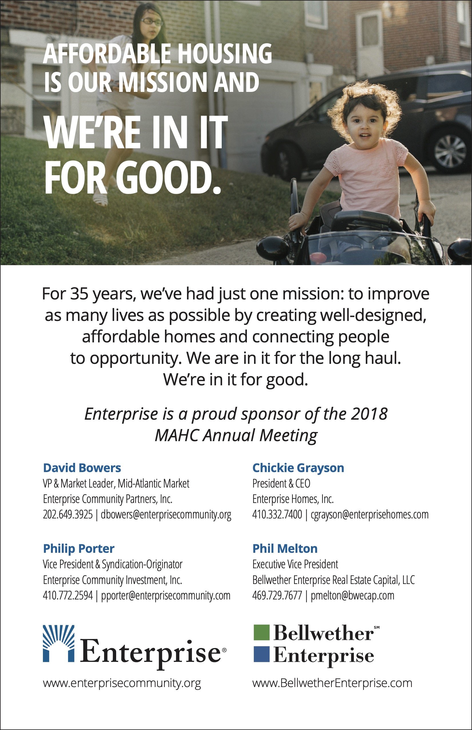 Young girl riding a small toy car and an older girl walking on a grassy lawn near a residential street. Overlaid text highlights a message about affordable housing and community support.