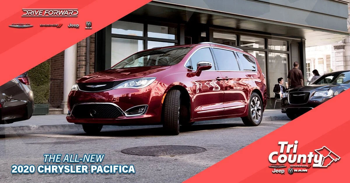 Red 2020 Chrysler Pacifica minivan parked on city street outside dealership
