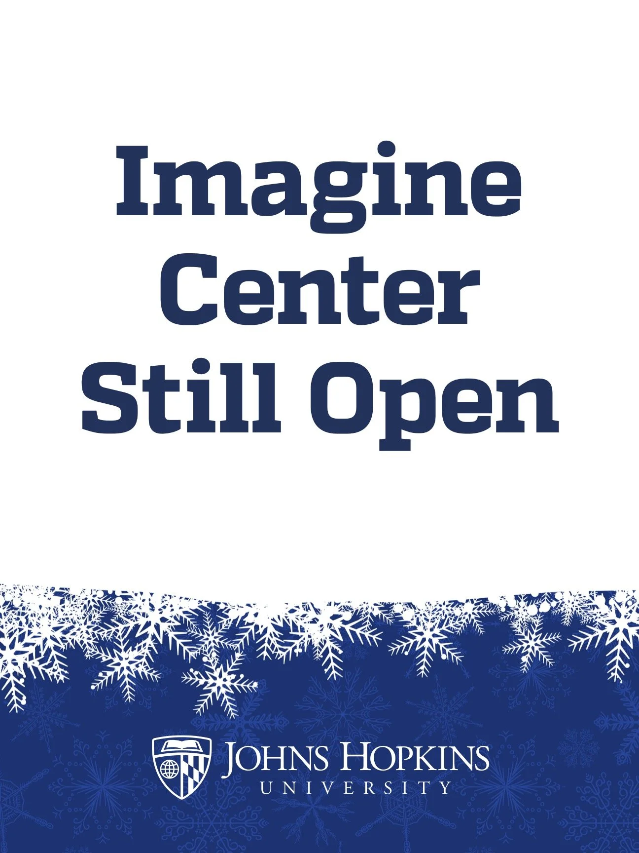 Sign that reads "Imagine Center Still Open" with Johns Hopkins University logo and snowflake design at the bottom.