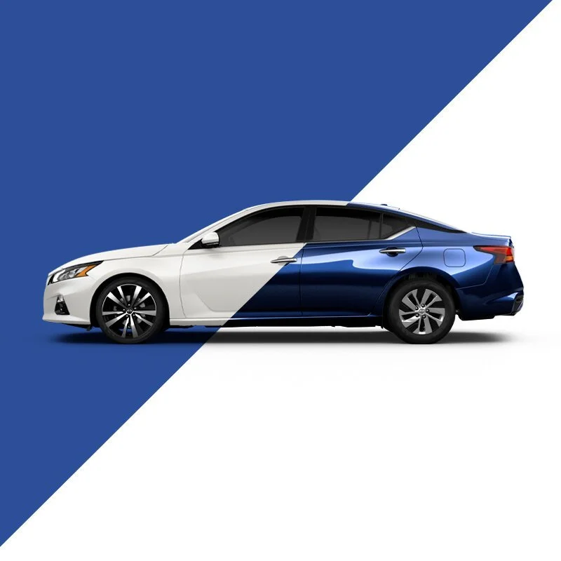 A modern sedan car with a two-tone paint job, half white and half blue, placed against a background with blue and white diagonals.