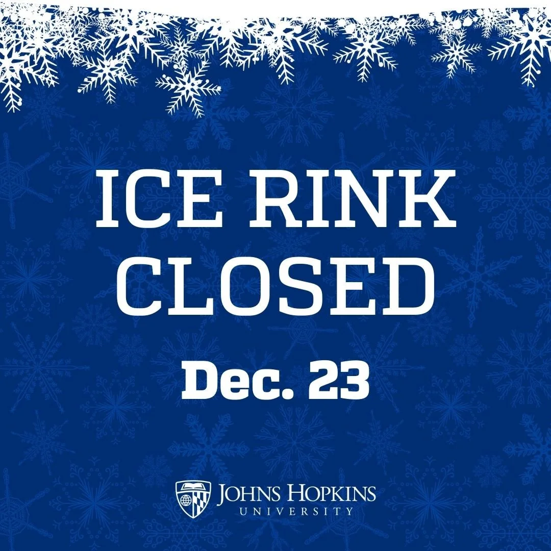 A blue background with white snowflakes at the top and throughout. Text in the center reads, 'Ice Rink Closed Dec. 23' with the Johns Hopkins University logo at the bottom.
