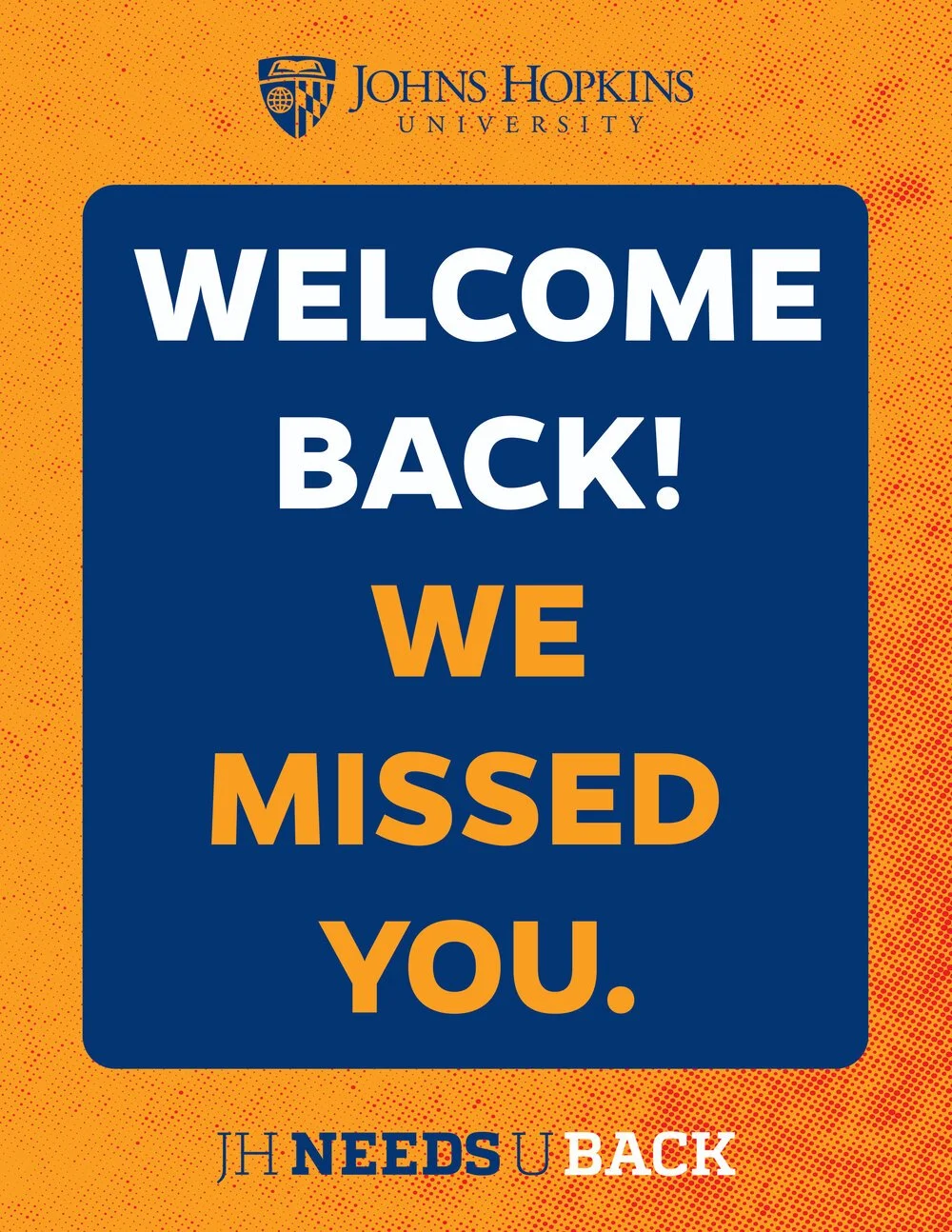 A welcome sign from Johns Hopkins University with a blue background and yellow border. The sign says, "Welcome Back! We Missed You." with the university logo and name at the top.