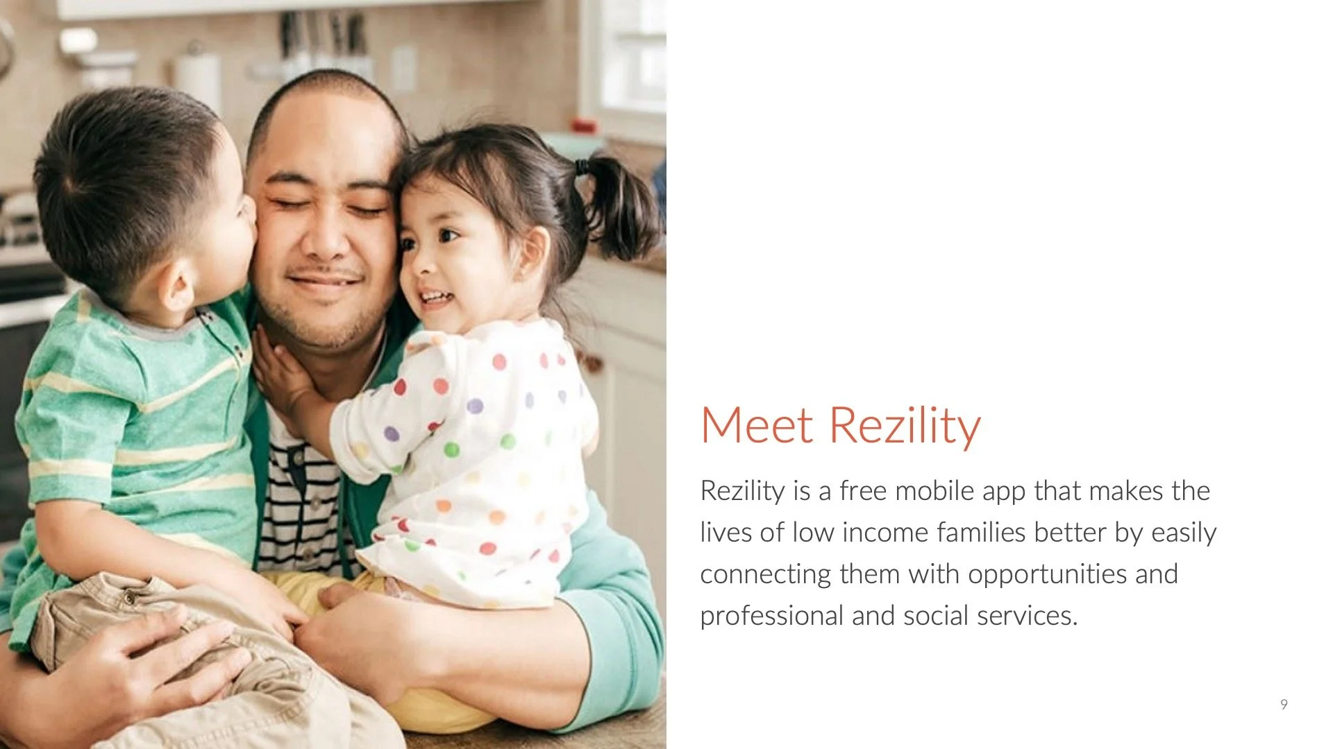 A man with two children hugging him in a kitchen, one child giving him a kiss and the other smiling