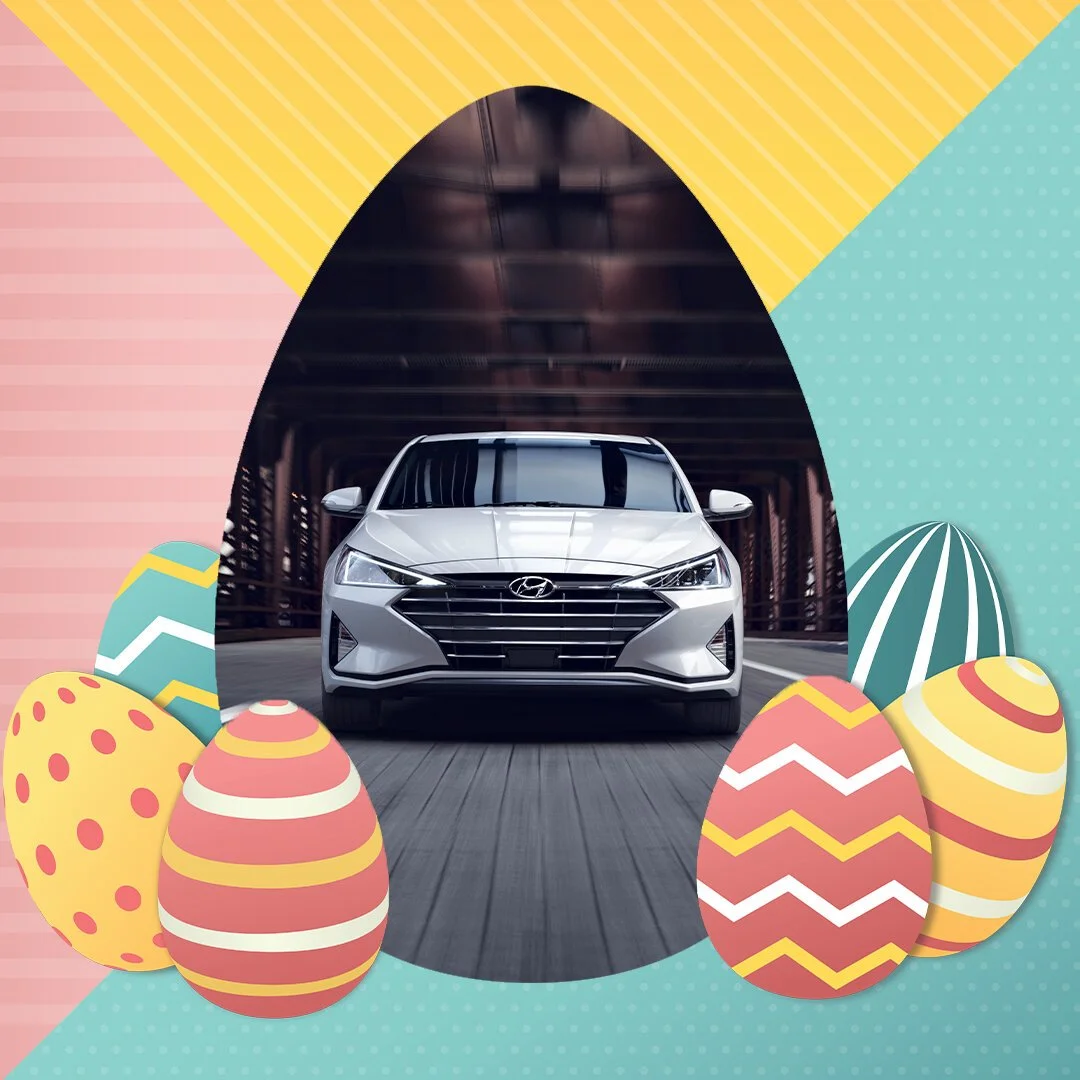 A silver Hyundai sedan driving through a bridge, surrounded by colorful Easter eggs, with a decorative Easter-themed background.