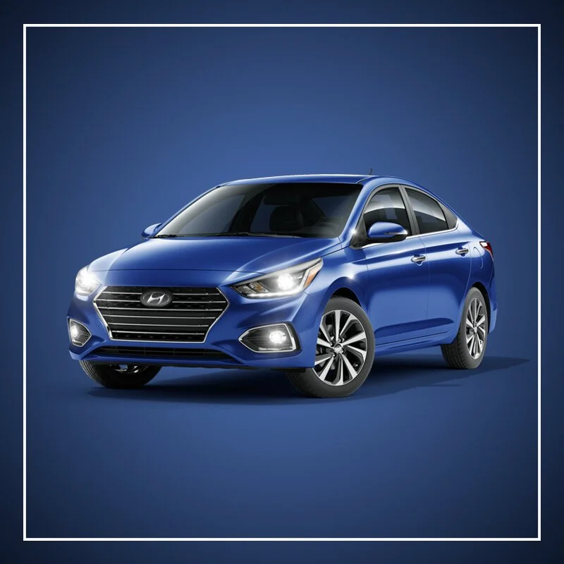 Blue sedan car against a dark blue background.