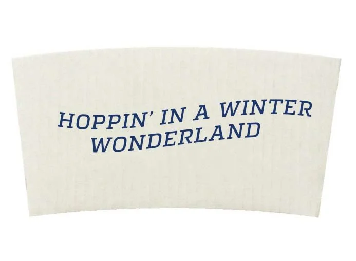 Text on a white background that reads "Hoppin' in a Winter Wonderland" in blue letters.