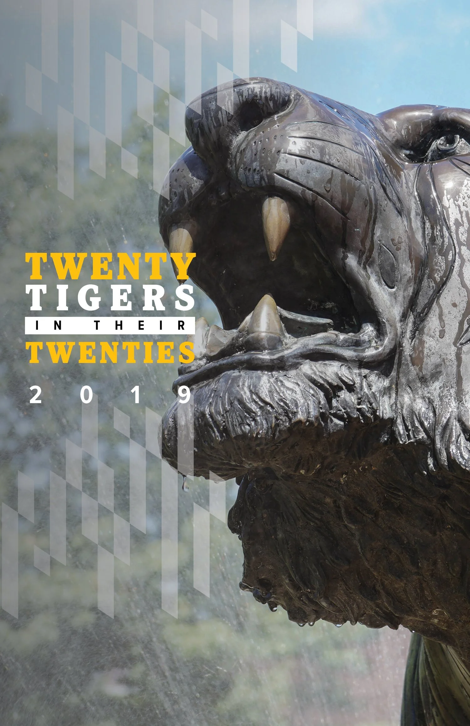Close-up of a lion statue with water dripping from its face, against a backdrop of trees and sky.