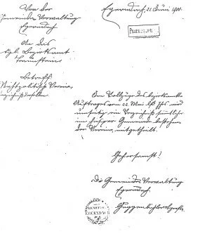 Handgeschriebene alte deutsche Briefseite mit Stempel, Schrift ist in Kurrent-Schrift, enthält Unterschriften und offizielle Stempel.