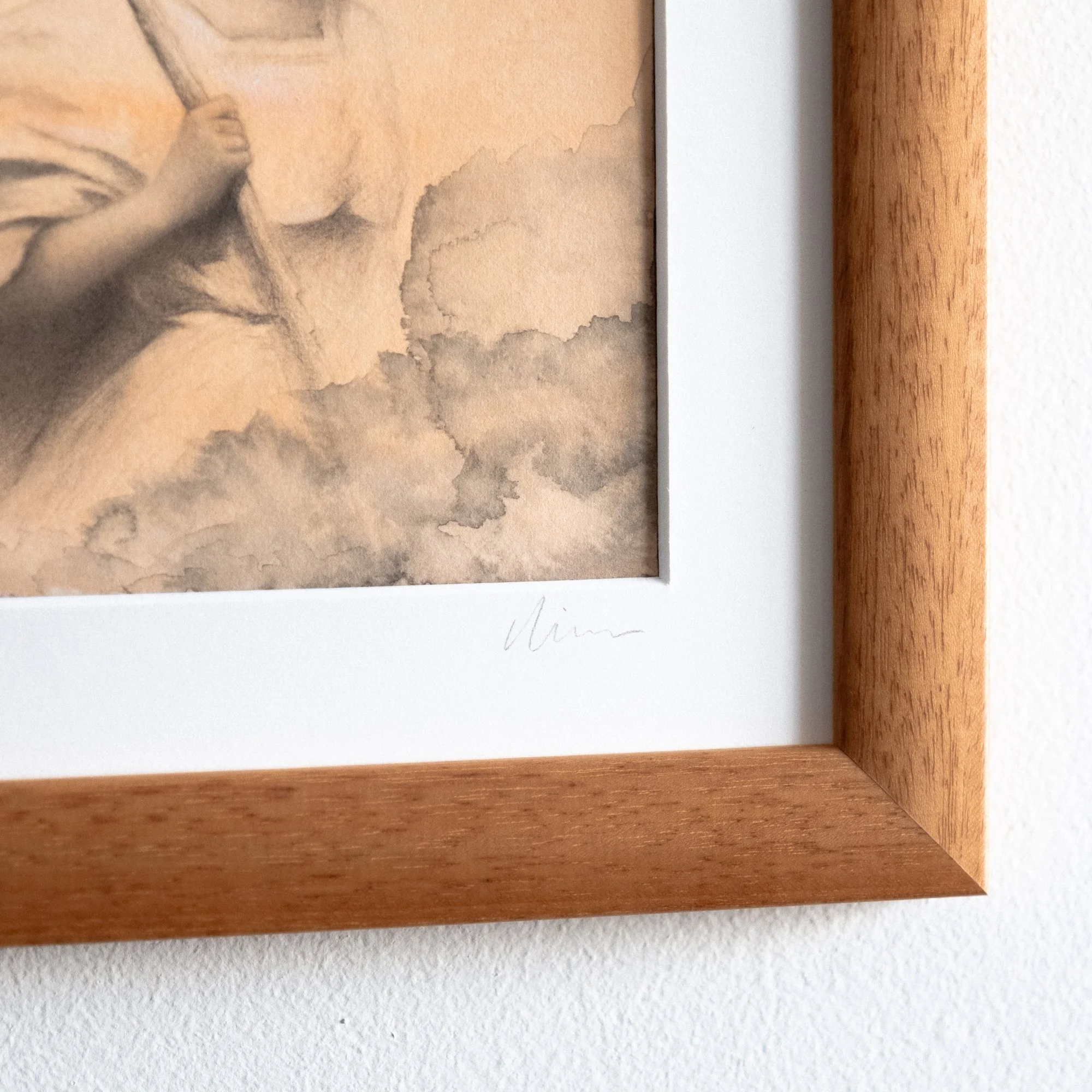 Close-up of "The Sun Bearer" by avidoma, showcasing the artist's signature and the beautiful warm wood frame