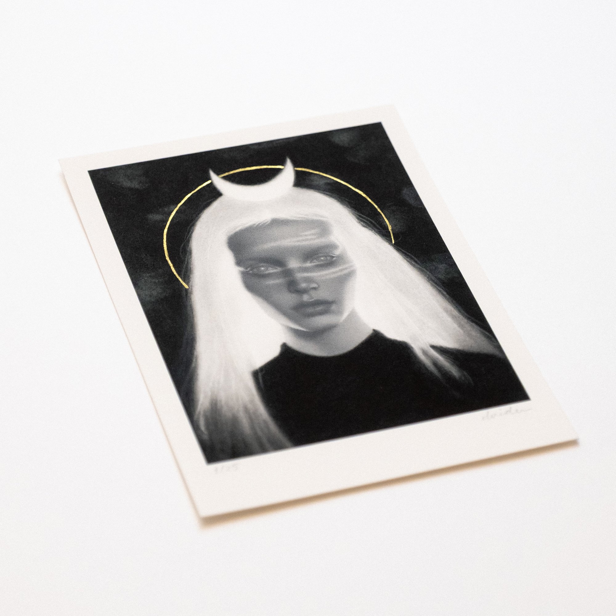 side view of Numina, Limited edition print featuring a symbolic portrait of a woman. Hand-painted with gold ink, embodying the divine feminine magic.