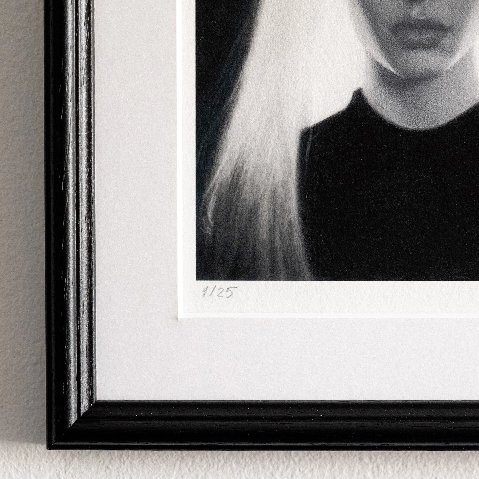 close-up of a framed limited edition print, showing the numbered edition