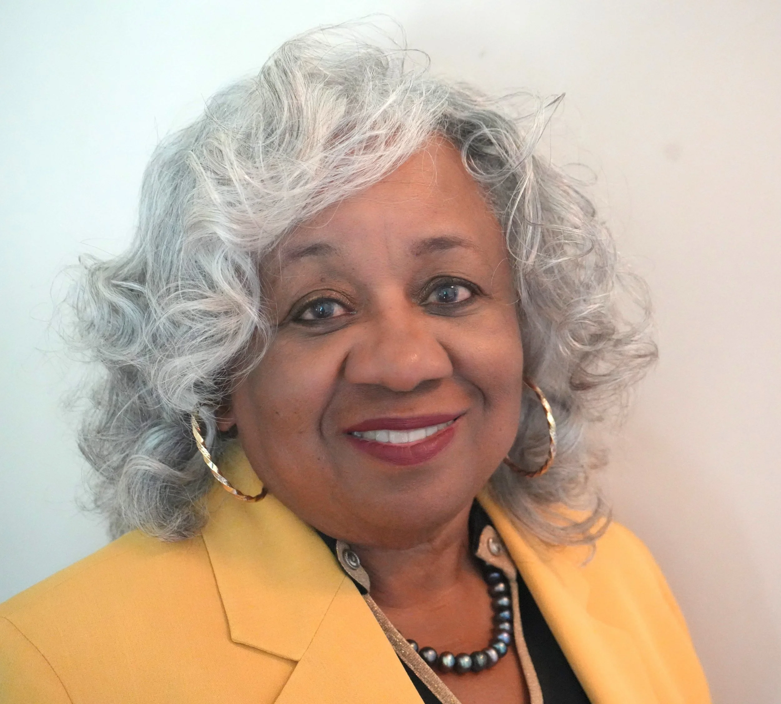 L Gould headshot 2025 - 2.JPG