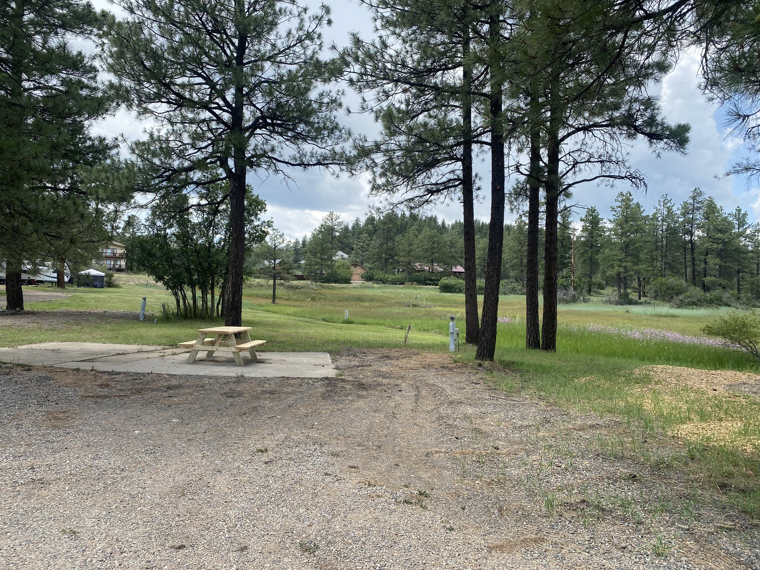 RV site with picnic table at Basecamp Pagosa.