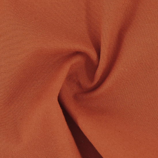 Un tissu de couleur marron ou beige, enroulé ou tordu.