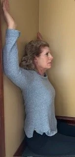 seated arm against wall 2.jpeg