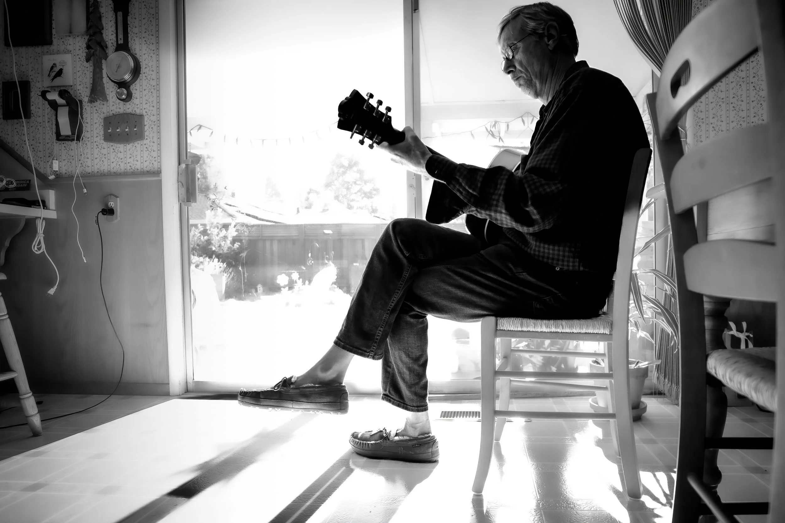 Early morning guitar picking. Music soothes even the savage beast.