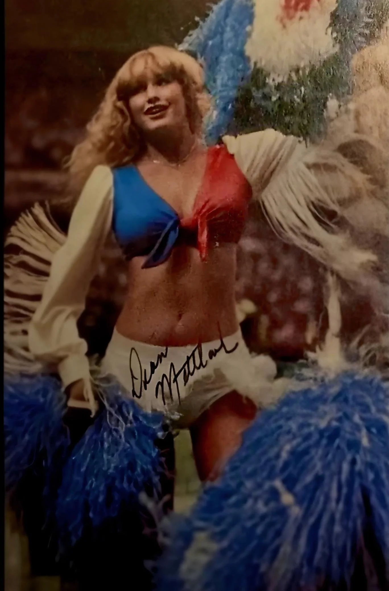 Diane Mettlach cheered from 1981 to 1983. She passed on March 21st, 2026.