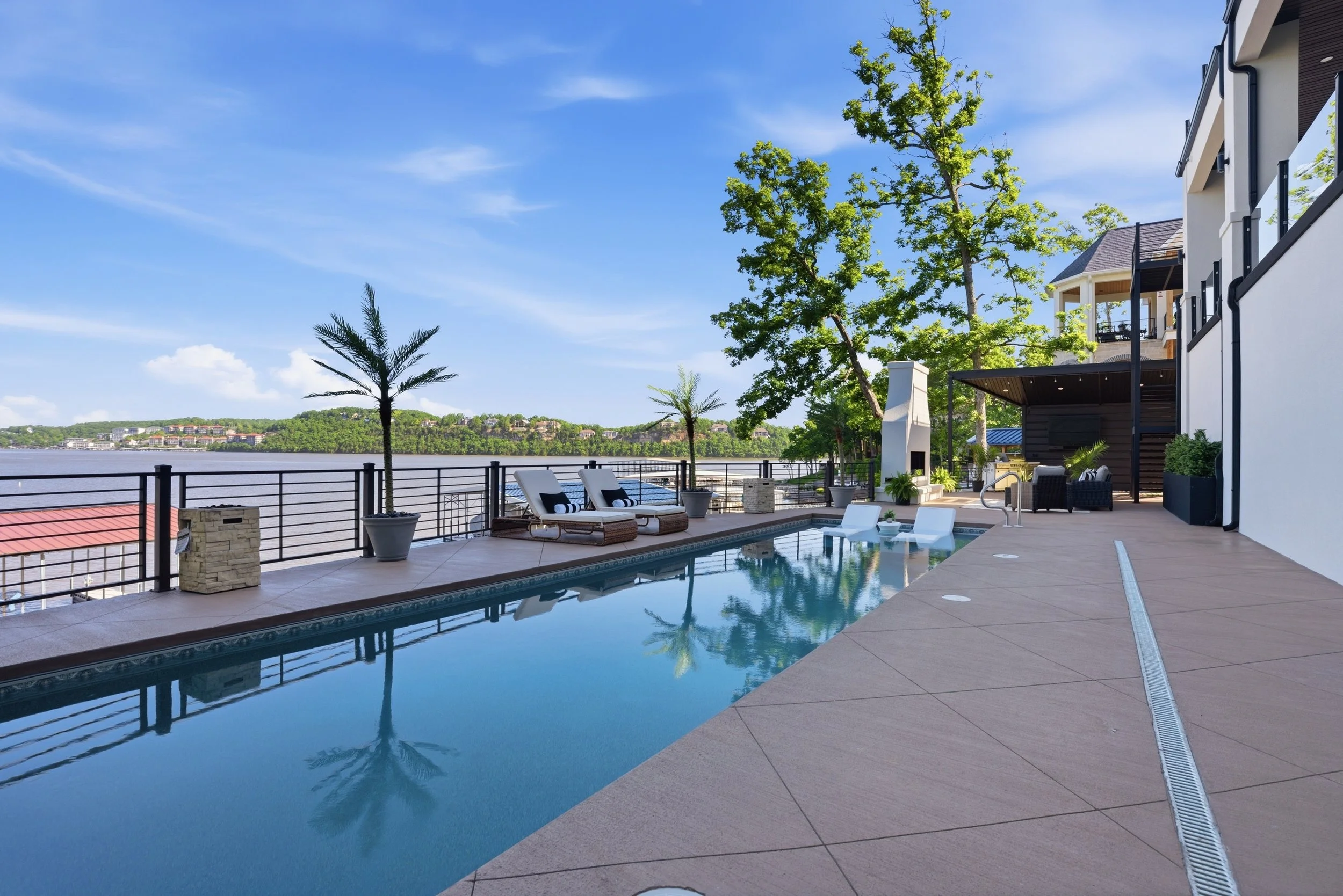 real estate photo of custom waterfront pool