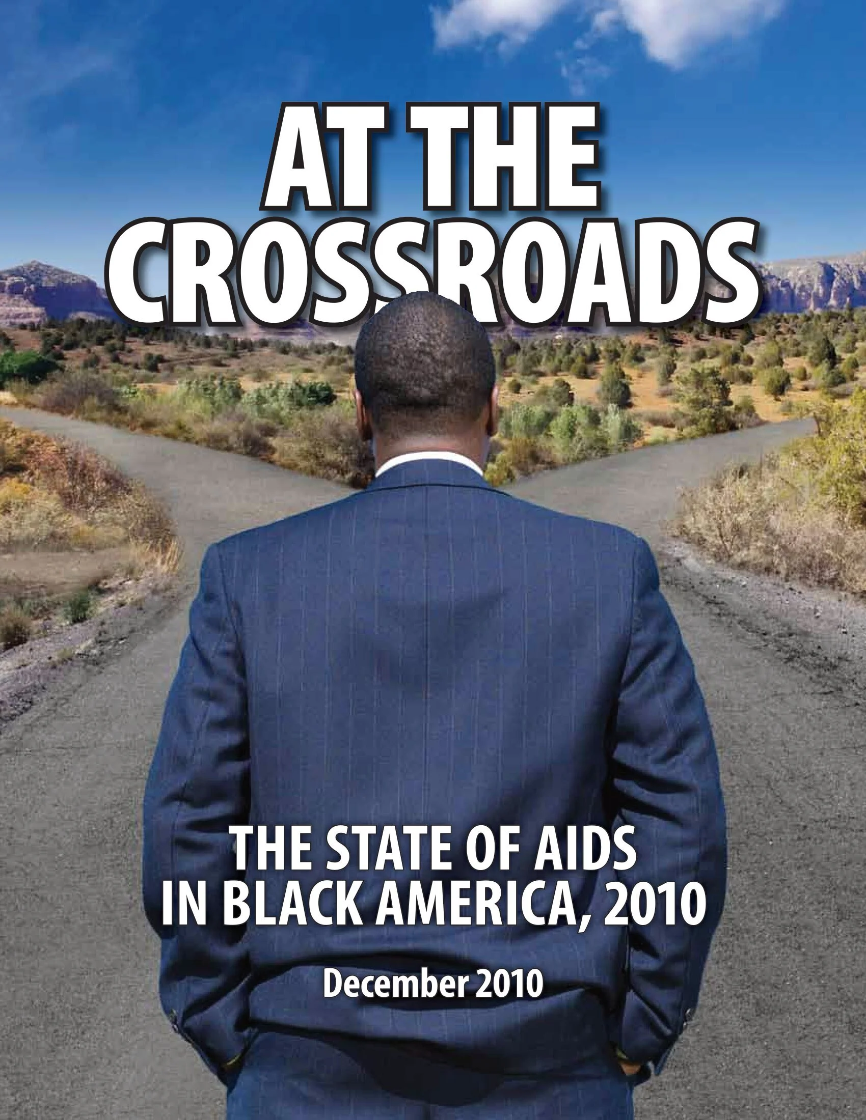Black man facing a road split into two