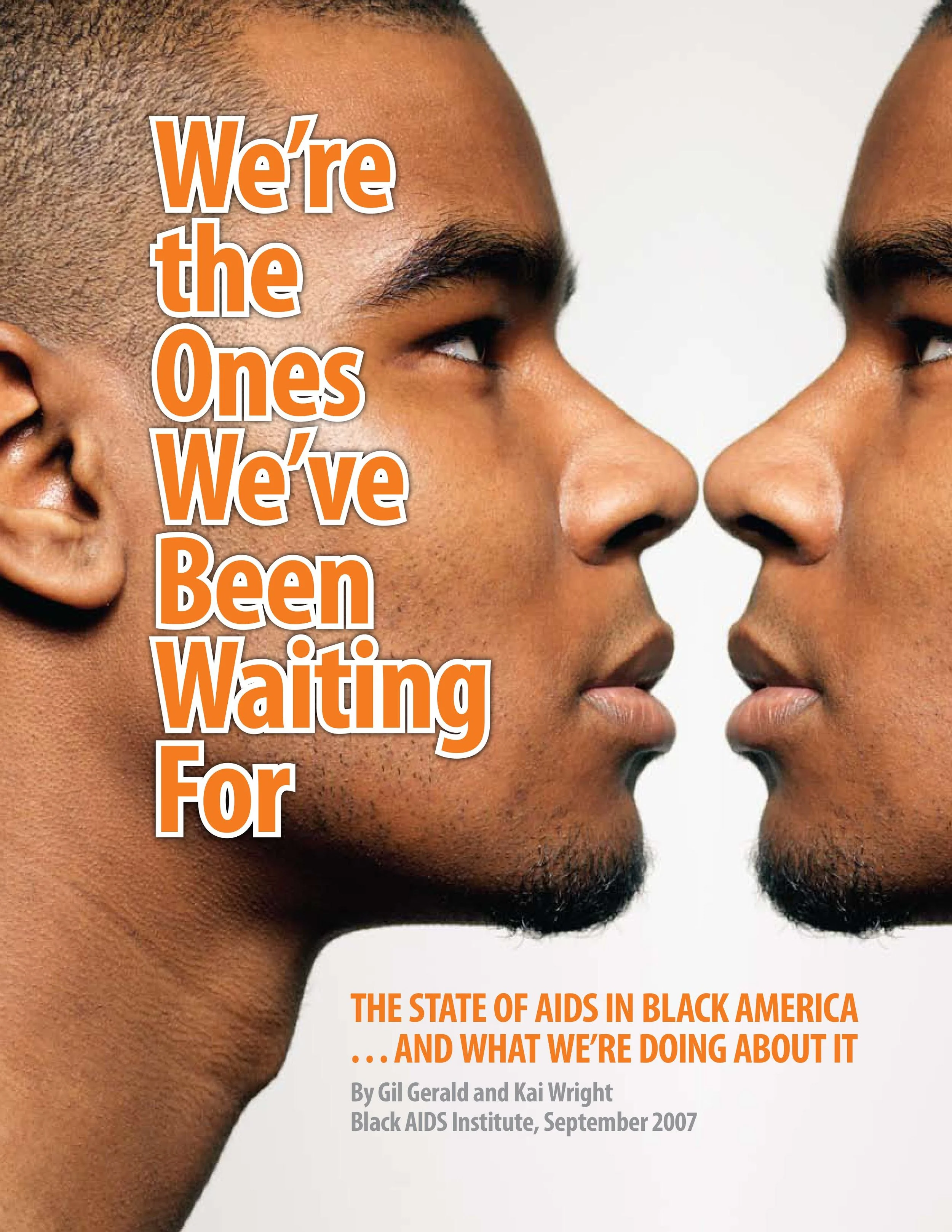A black man's side profile looking at his own reflection